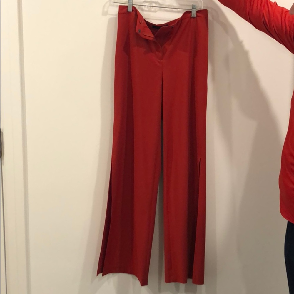 BCBG red pants with slit at bottom